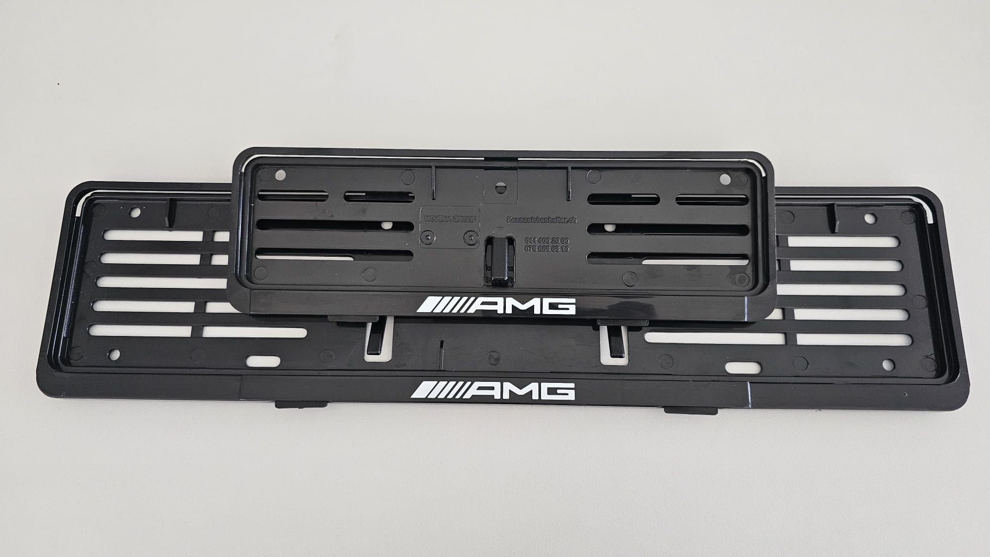 Kennzeichenhalter mit Beschriftung AMG